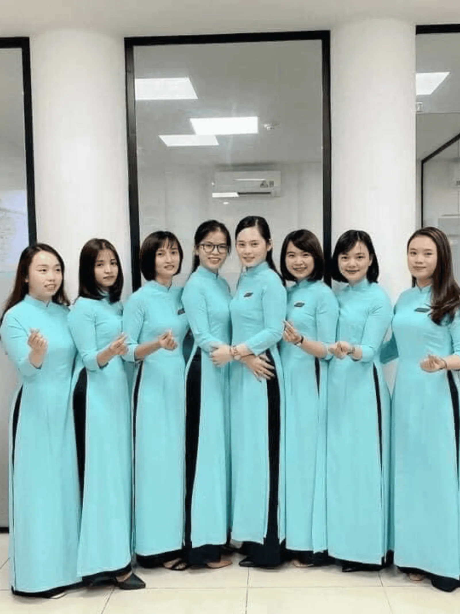 Áo dài đồng phục cổ tròn vải lụa Thái Tuấn Fatraly